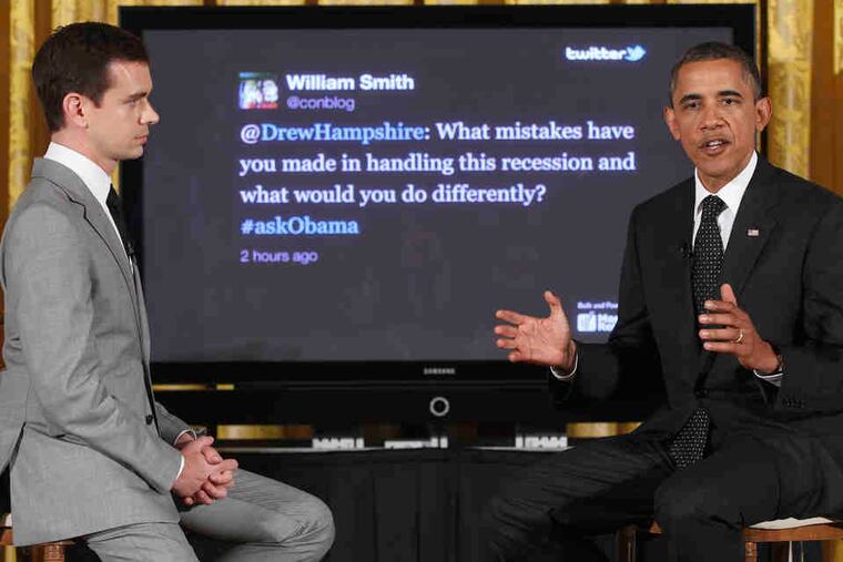 President Obama, joined by Twitter cofounder Jack Dorsey, answers questions at the town hall at the White House.