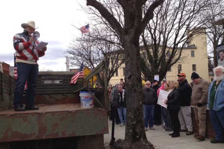 About 150 gun-rights advocates converged outside the Bucks County courthouse in Doylestown Saturday in support of the Second Amendment and to protest firearm restrictions. (Aubrey Whelan / Staff)
