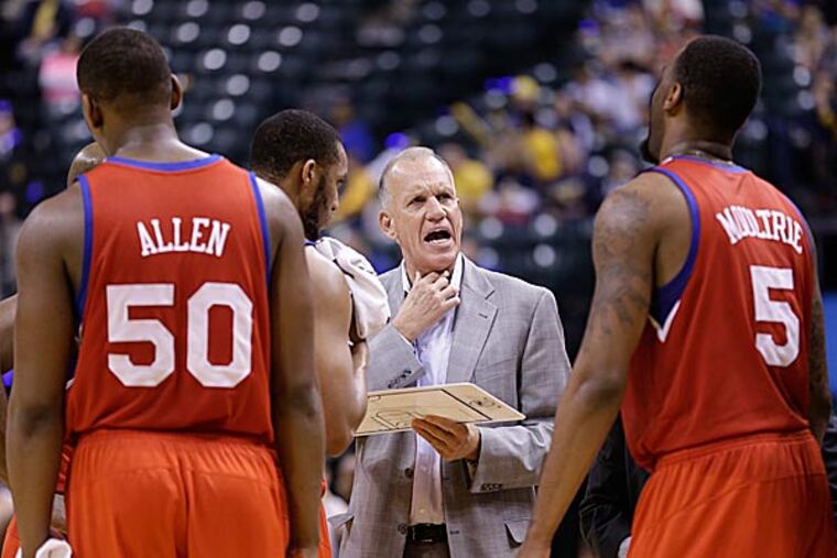 Doug Collins is a reminder that a coach's popularity doesn't have anything to do with a team's success. (Michael Conroy/AP)