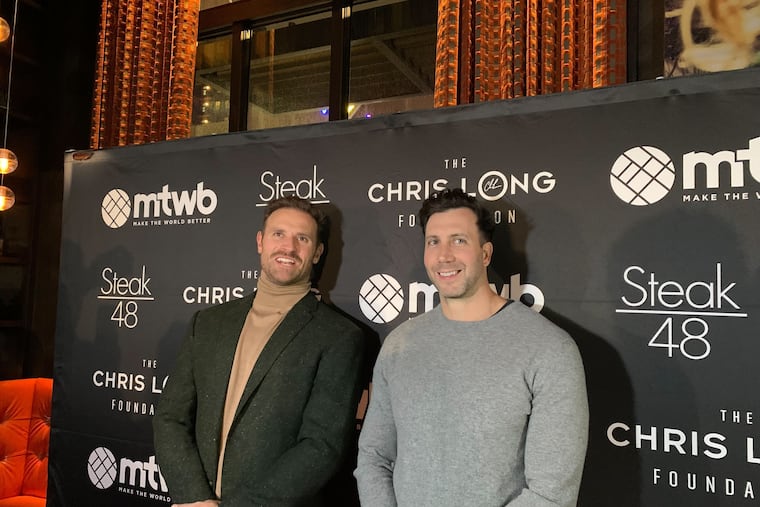 Chris Long, left, and Connor Barwin at the third annual Team Dinner on Tuesday at Steak 48.