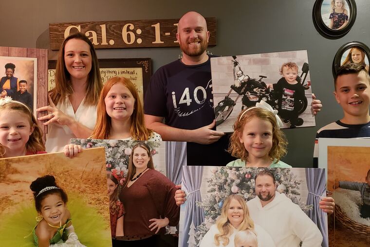 Brian and Dawn Bononi (back row) with their children (left to right) Ivana, Amberleigh, Clora, and Ephrem.