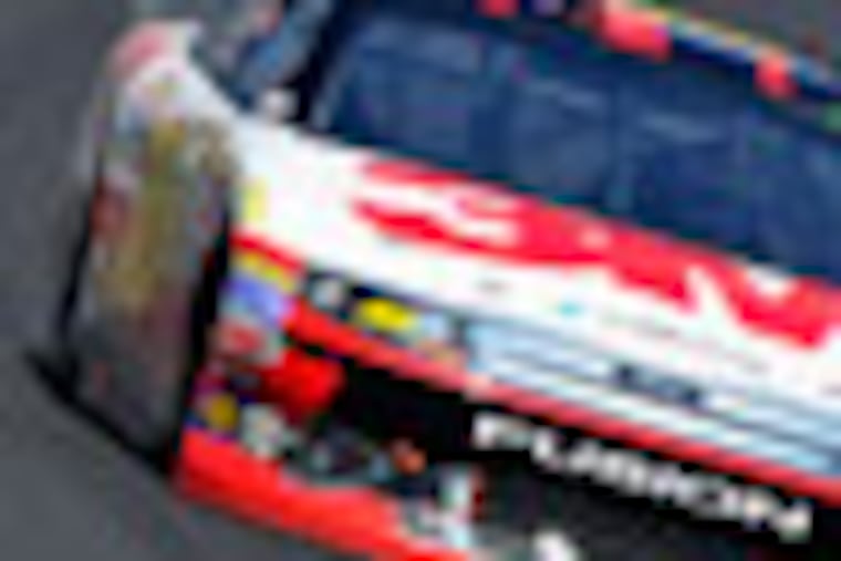 Race winner Greg Biffle during the Pure Michigan 400 Race auto race at Michigan International Speedway on Sunday Aug. 19, 2012 in Brooklyn, Mich. (AP Photo/Autostock, Nigel Kinrade)