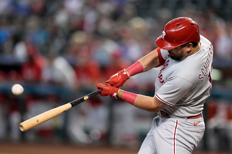 Philadelphia Phillies' Kyle Schwarber connects for a home run against the Arizona Diamondbacks during the first inning.
