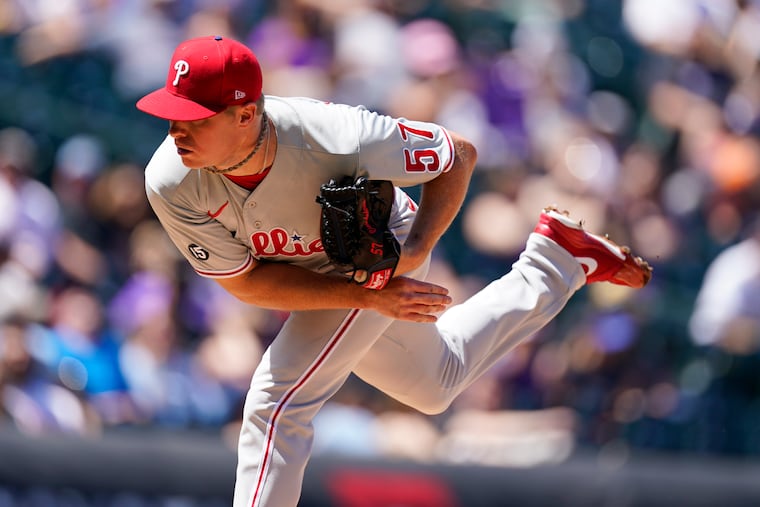 Philadelphia Phillies starting pitcher Chase Anderson works the Colorado Rockies in the first inning of a baseball game Sunday, April 25, 2021, in Denver. (AP Photo/David Zalubowski)