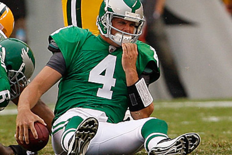 Kevin Kolb reacts after being sacked in first half. (Ron Cortes/Staff Photograher)