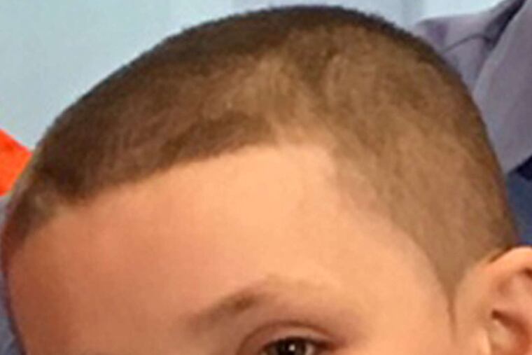 Kevin, 12, plays trombone.