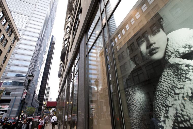 One of the H&M store windows on 16th and Walnut Streets in a building owned by Midwood CEO John Usdan.