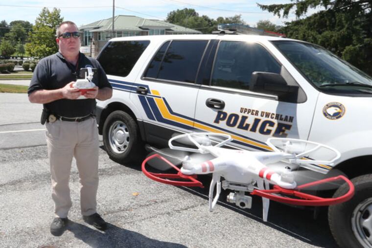 Upper Uwchlan Township police chief said he's heard no complaints about his department's drone. He says lots of residents have drones of their own. Detective Thomas Jones operates their drone. Monday, August 3, 2015. (STEVEN M. FALK / Staff Photographer)