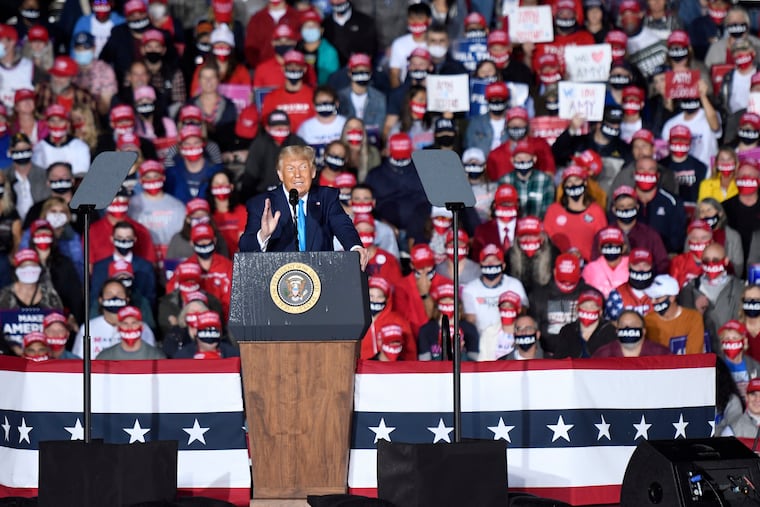 President Donald Trump speaks during a campaign rally at Harrisburg International Airport, Saturday, Sept. 26, 2020, in Middletown, Pa. Gov. Tom Wolf's limits on crowd sizes were no longer in effect, though Wolf asked Trump not to hold the rally, saying the president's previous rallies had violated the state's mask and crowd requirements and that it was a danger for the spread of the coronavirus. (AP Photo/Steve Ruark)