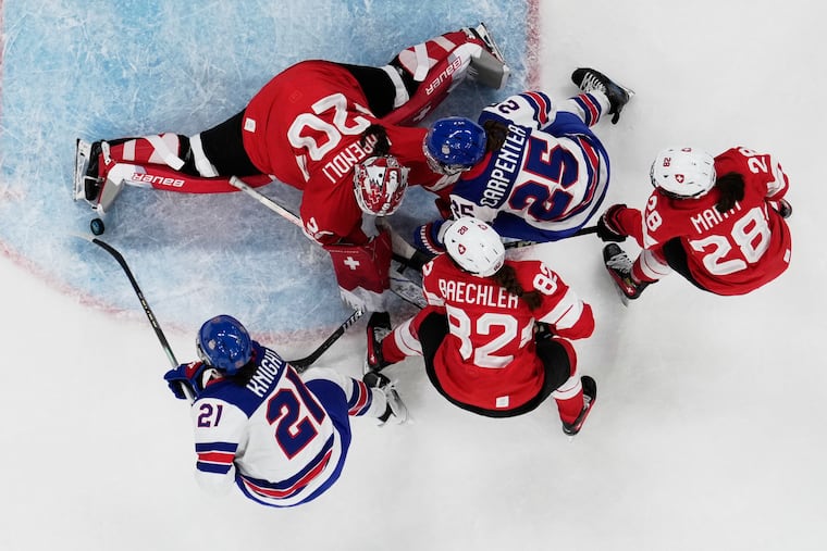 Hilary Knight (21) and the U.S. women's hockey team are undefeated headed into Monday's semifinal.