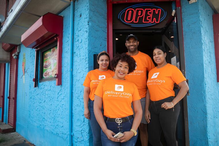 Delivery Guys owner Víctor Tejada and three of his drivers who deliver food in North and Northeast Philadelphia: (clockwise from left) Lorainy Espinal, Tejada, Nathalie Zapata, and Katty Corporán.