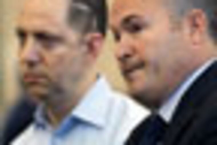 John Grant, left, listens as his civil union partner Daniel Weiss testifies before the the Senate Judiciary Committee in Trenton, N.J., Tuesday, Jan. 24, 2012, during a hearing on a bill allowing gay couples to marry. When Grant was in a life-threatening automobile accident and rushed to a New York hospital in 2010 before that state had a gay marriage law, Weiss said he couldn't authorize badly needed surgery or even go through his partner's wallet to find his health insurance card. (AP Photo/Mel Evans)