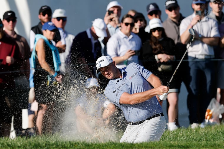 Sepp Straka hits out of the bunker on the par-4 18th hole during third round of the Truist Championship.