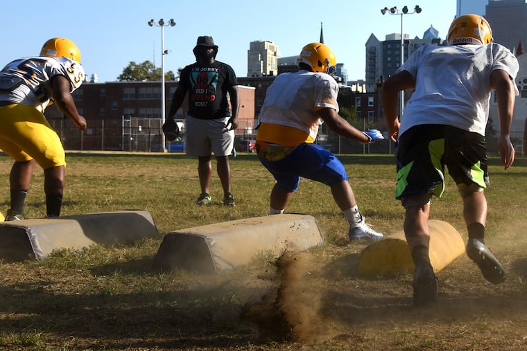 Ben Franklin High School coach Sharrif Floyd at football practice at the Roberto Clemente Playground October 1, 2019.