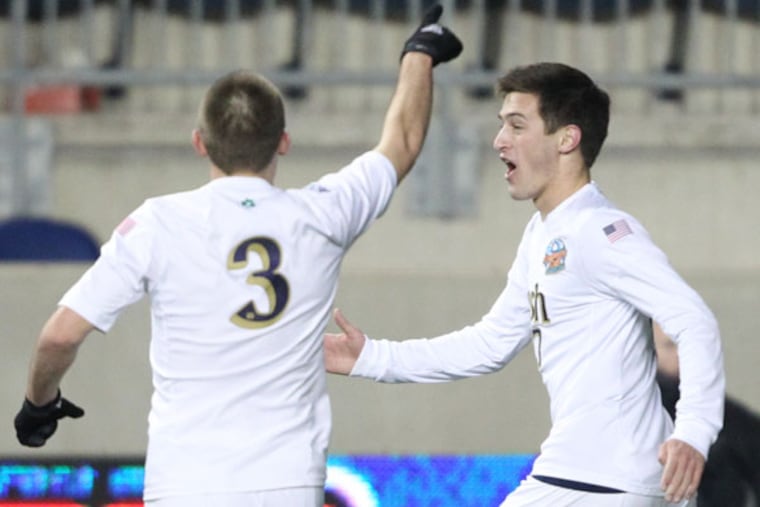 Notre Dame's Patrick Hodan (right) celebrates his second goal of the
game with teammate Connor Klekota. (Charles Fox/Staff Photographer)