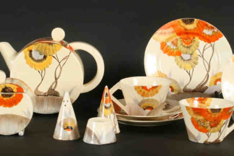 Clarice Cliff's Rhodanthe pattern features pinwheel-like flowers in yellow and orange. Individual pieces and place settings of the 20th-century pottery sold earlier this year at Kamelot Auctions for $200 to $500. Nature is a frequent theme of her work.