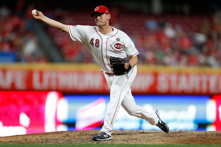 Jared Hughes, here pitching for the Reds, is joining the Phillies bullpen.