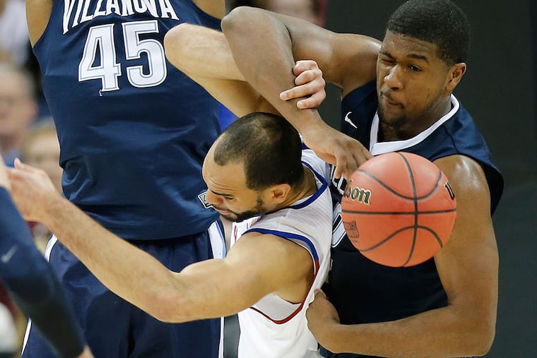Villanova's Kris Jenkins strips the ball away from Kansas' Perry Ellis.