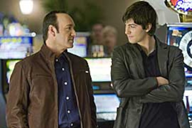 Kevin Spacey (left) produced and stars in "21," playing an M.I.T. professor who is a mentor to Jim Sturgess in a scheme to beat Vegas casinos.