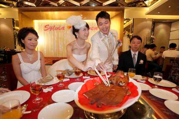 Newlyweds Steven Leung and Sylvia Cheung served their guests a 13-course meal - except the traditional shark fin soup. For the couple, it was a gesture against the slaughter of sharks.