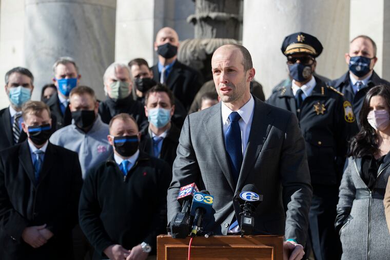 Delaware County First Assistant District Attorney Tanner Rouse spoke Friday at a memorial for Philadelphia Police Sgt. Robert Wilson III in Media. Wilson was killed six years ago during a robbery in North Philadelphia, and Rouse, who worked with Wilson as a former prosecutor in Philadelphia, organized a memorial for him on the anniversary of his death.