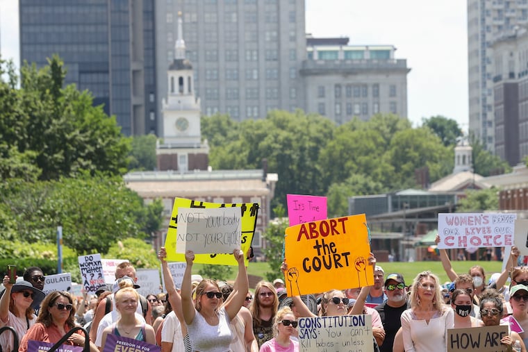 People gather for a “Defend Our Rights” rally in support of abortion rights for all Pennsylvanians, hosted by state Attorney General and gubernatorial candidate Josh Shapiro and other Democratic elected officials, in front of the National Constitution Center in Philadelphia on Saturday.