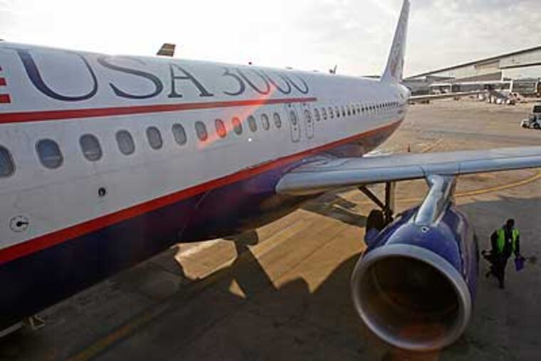 USA 3000 only takes credit cards for items purchased on flights. Cash is not accepted.( Michael S. Wirtz / Staff Photographer )