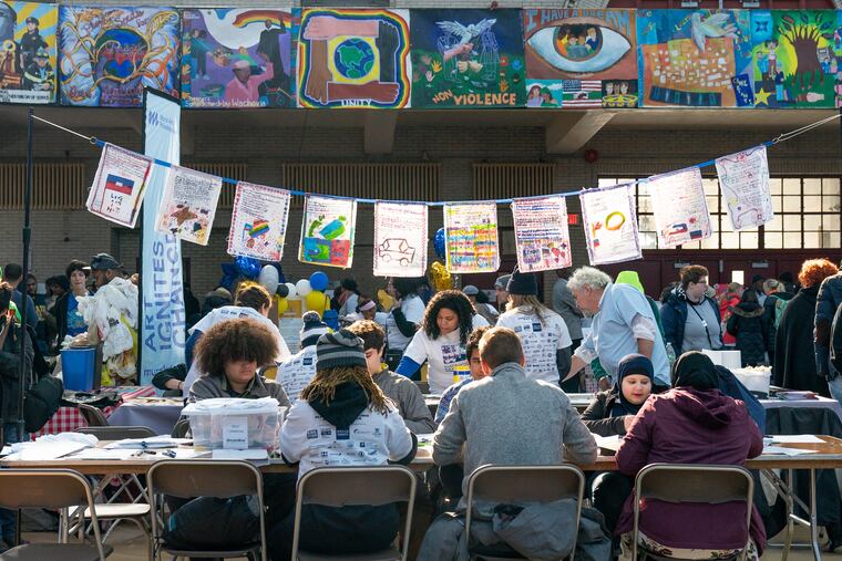 Students and adults participate in the Martin Luther King day of service at Girard College, in Philadelphia, January 21, 2019. JESSICA GRIFFIN / Staff Photographer.
