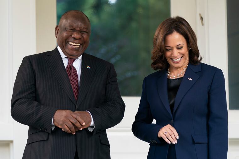 Vice President Kamala Harris greets South African President Cyril Ramaphosa (left) at the Vice President's official residence in the U.S. Naval Observatory compound in Washington.