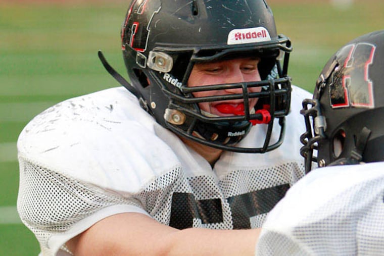 Haddonfield's Charlie O'Neill blocks a teammate during practice. (AKIRA SUWA / Staff Photographer)