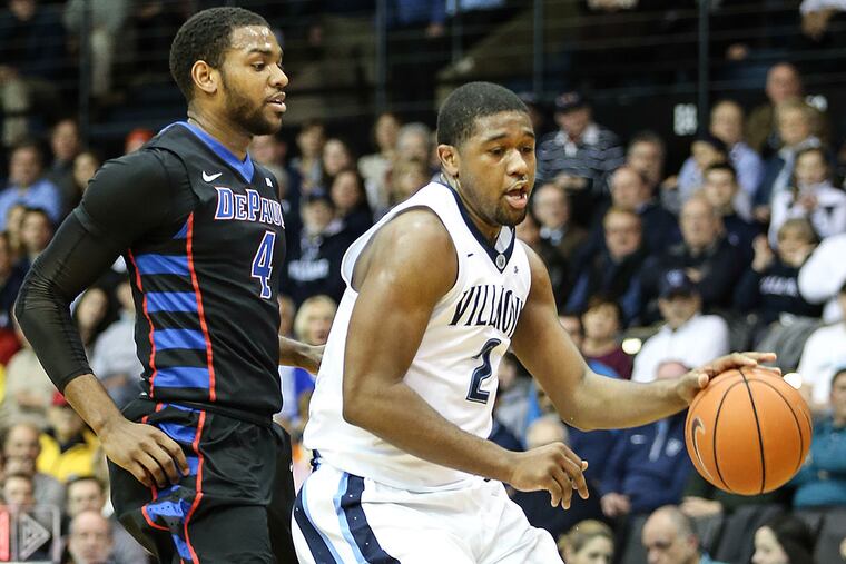 Villanova forward Kris Jenkins drives past DePaul forward Myke Henry.