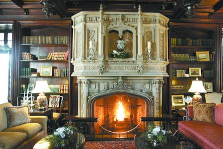 The mansion's library , left. Above, Malle Tocce (left) and Carol Jones look over at a table setting in the dining room. The tours visit six public rooms at Drumthwacket.