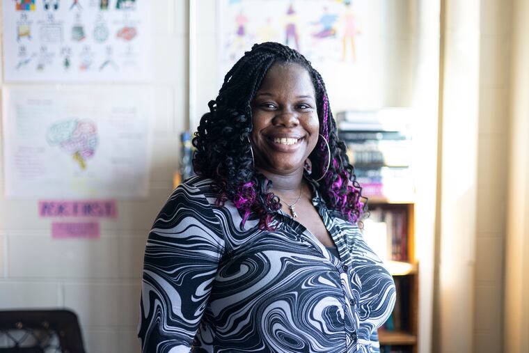 MiMi Gravley, of West Philadelphia, poses for a portrait at Strawberry Mansion High School.