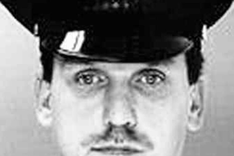 Eric Floyd (left), accused of killing Sgt. Stephen Liczbinski, attacked one of his court-appointed attorneys.