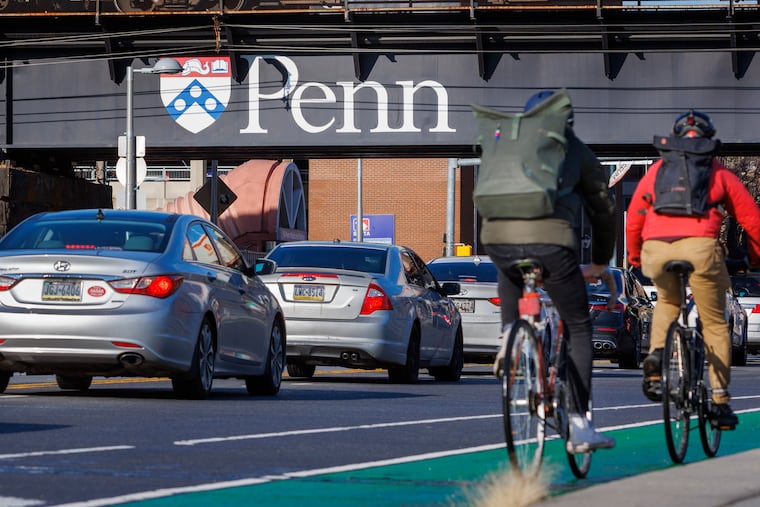 Commuters along South Street bridge, Monday, Dec. 11, 2023. The University of Pennsylvania’s endowment grew by $1.4 billion for the year ending June 30, topping $22.3 billion, according to university financial statements.