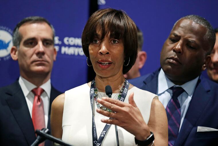 FILE - In this June 8, 2018, file photo, Baltimore Mayor Catherine Pugh addresses a gathering during the annual meeting of the U.S. Conference of Mayors in Boston. The lawyer for Baltimore’s mayor is making an announcement Thursday, May 2, 2019, amid growing pressure for the city’s top leader to resign over a scandal involving her self-published children’s books. Pugh has been in self-imposed seclusion for a month with what attorney Steven Silverman has said is deteriorating health after a bout of pneumonia.
