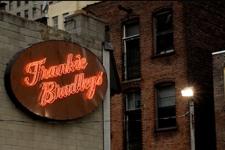 The restored original neon sign (with the original spelling) outside Franky Bradley's in Midtown Village.