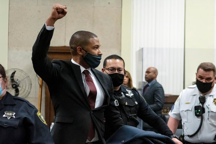 Actor Jussie Smollett is led out of the courtroom after being sentenced at the Leighton Criminal Court Building on March 10 in Chicago.