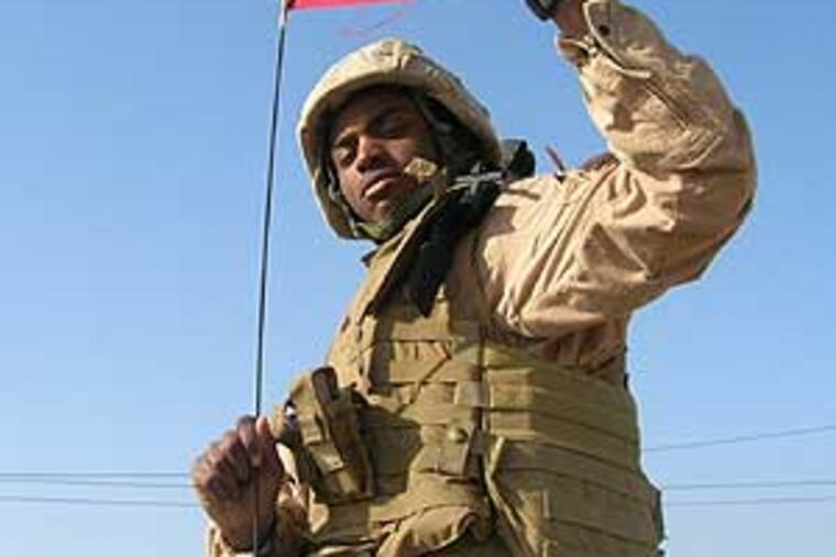 Marine Sgt. Kareem Cox in Iraq. He said the arresting officer told him: “You didn’t follow the rules.”