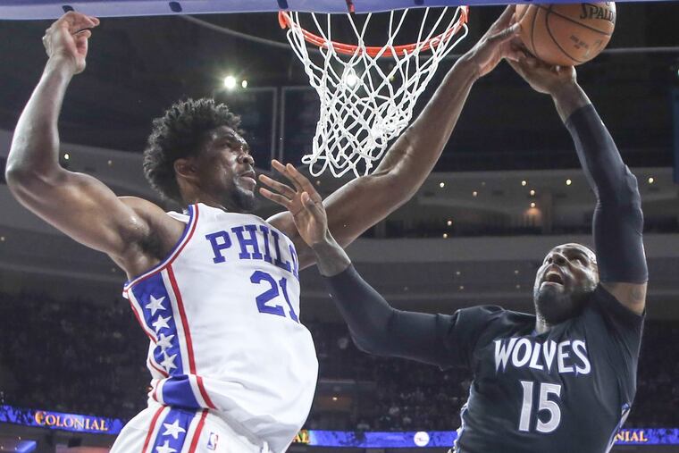 Sixers' Joel Embiid blocks the shot of Timberwolves' Shabazz Muhammad during the 2nd quarter at the Wells Fargo Center in Philadelphia, Tuesday, January 3, 2017. Sixers beat the Wolves 93-91. STEVEN M. FALK / Staff Photographer
