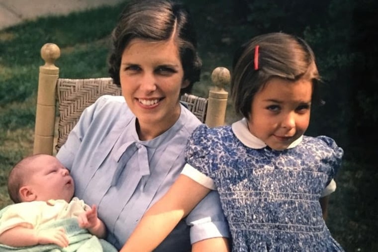Mrs. Rhoads, shown here with two of her children, "inherited the gentle kindness, sense of fun, and appreciation of history which imbued everything she did,” her family said.