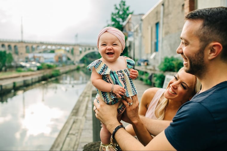 Six-month-old CeCe with parents Juliet and Karl