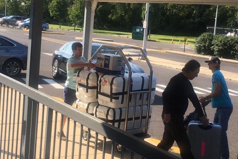 Volunteers gathering supplies for the relief effort to St. John.
