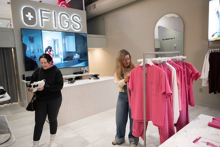 CHOP pediatric nurses, Cori Cavitt, left, and Payton Ingiosi shop at Figs clothing store in Rittenhouse Square.