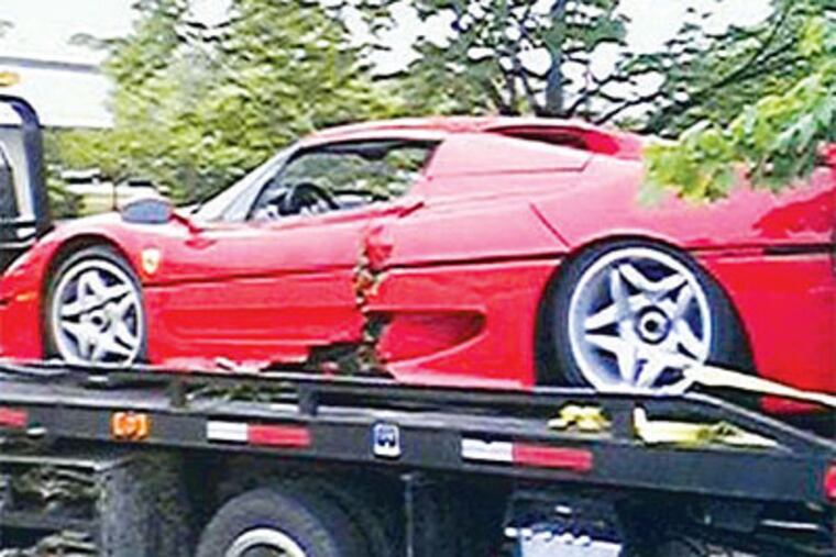 The $729,000 Ferrari that con man/pilot Tom Baker stole from a Main Line car dealership in '03. (WreckedExotics.com)