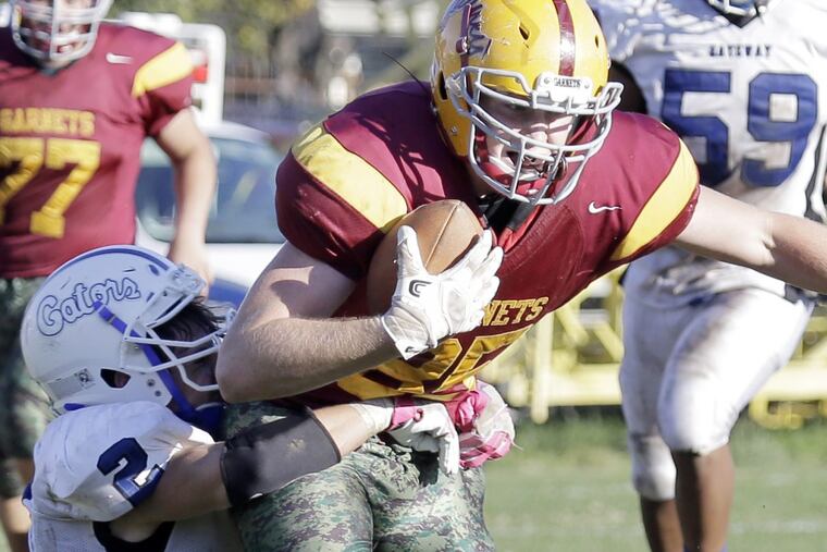 Gateway senior Jared Clayton (No. 2 in white), making a tackle against Haddon Heights in 2016, has led the Gators to a 7-1 record entering the S.J. Group 1 tournament.