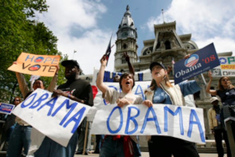 Obama campaigners (from left) Kentu Malik, Alec Page and Karen Page carry on a primary-day rally at City Hall.The group was coming from a raucous encounter with a Clinton contingent at 12th and Filbert Streets.