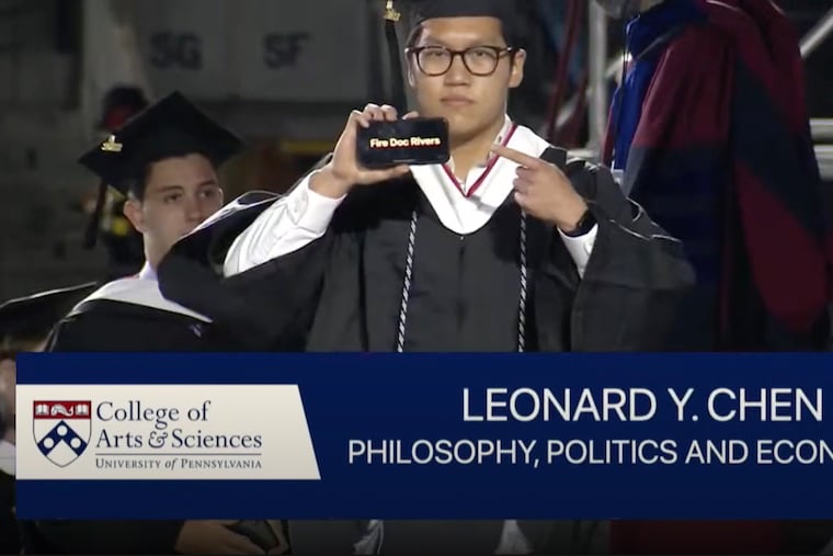 University of Pennsylvania graduate Leo Chen, 22, made a splash at his commencement ceremony when he flashed "Fire Doc Rivers" on his phone.