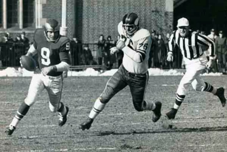 Sonny Jurgensen, running for a first down against the Vikings at Franklin Field on Dec. 15, 1963, played in 83 games as an Eagle between 1957 and 1963.
