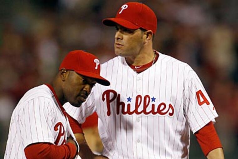 Danys Baez allowed one earned run in relief on Friday night and picked up the loss. (Yong Kim/Staff Photographer)